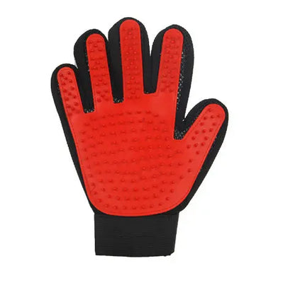 BeauGlove pet grooming glove removing loose fur from a dog